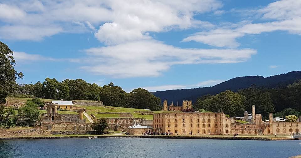 The sandstone ruins of the Port Arthur convict settlement, Tasmania, across the water