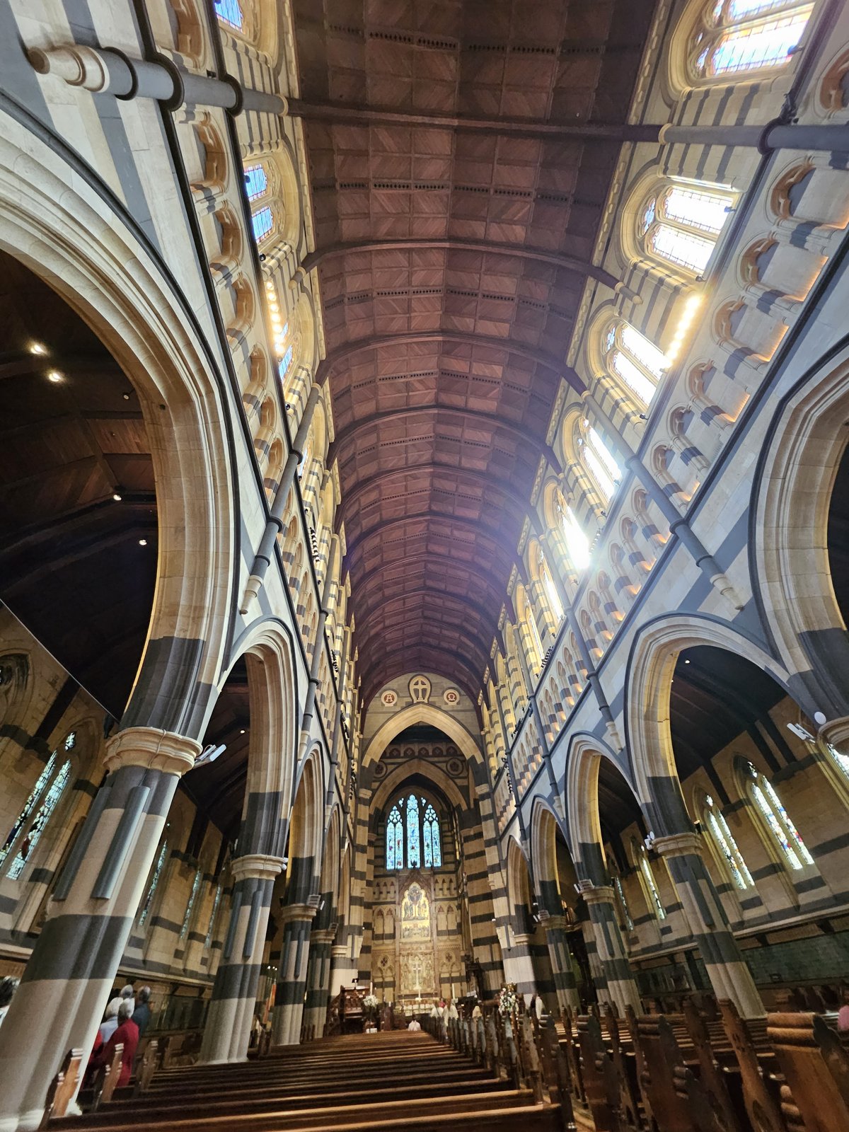 Inside St Paul's Cathedral, Melbourne, looking down the nave to the altar