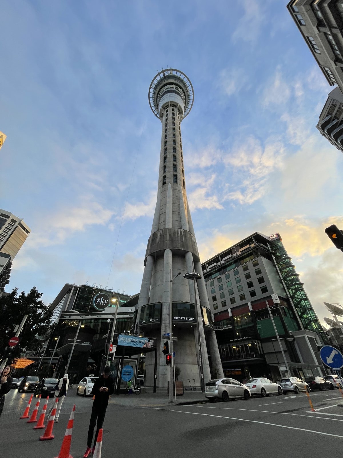 Auckland's Sky Tower rising above the SKYCITY complex at dusk, New Zealand